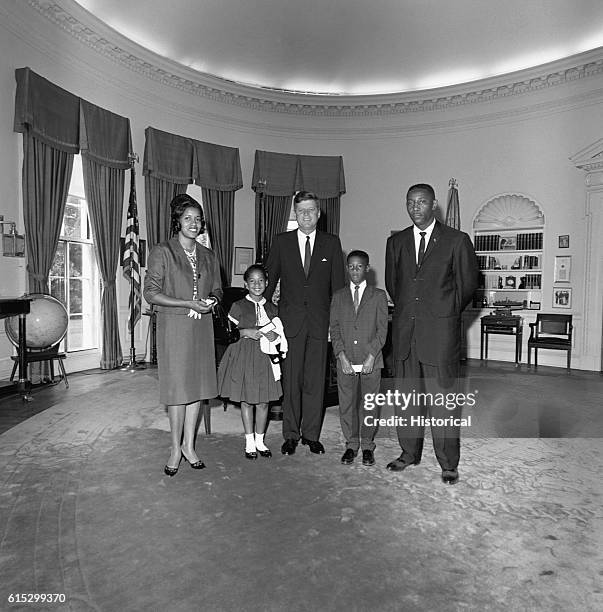 President John F Kennedy meets with Myrlie Evers, two of her children, and her brother-in-law, Charles Evers, on June 21, 1963. Myrlie Evers is the...