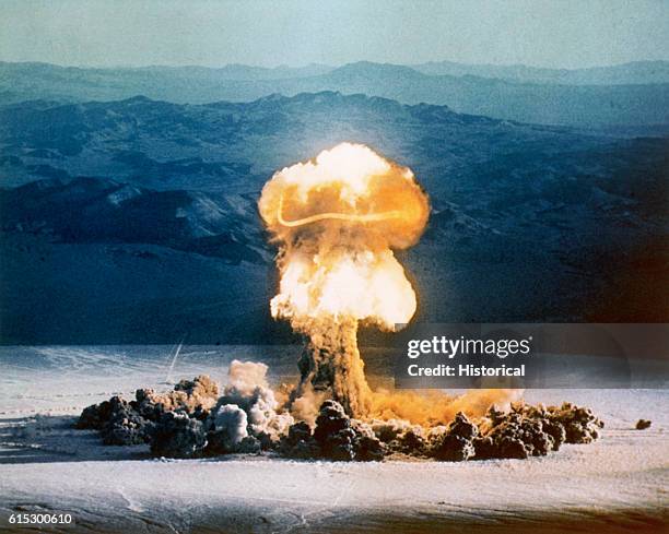 The fireball and plume from the Operation PlumbBob shot Priscilla atomic explosion, Camp Mercury, Yucca Flats, Nevada, June 24, 1957.