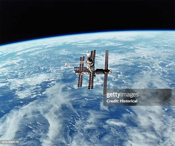 The Russian space station Mir in orbit above Earth after its encounter with the space shuttle Discovery. February 6, 1995. | Location: above Earth.