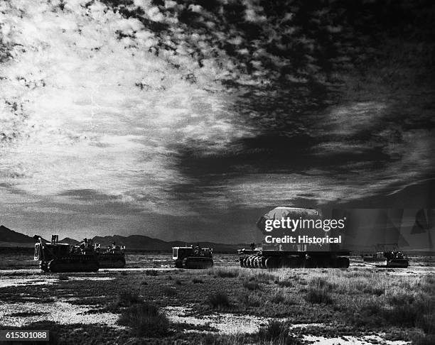 'Jumbo' - a 120-ton steel containment vessel for use in case of an unsuccessful explosion - arrives at the site of the the Trinity nuclear test in...