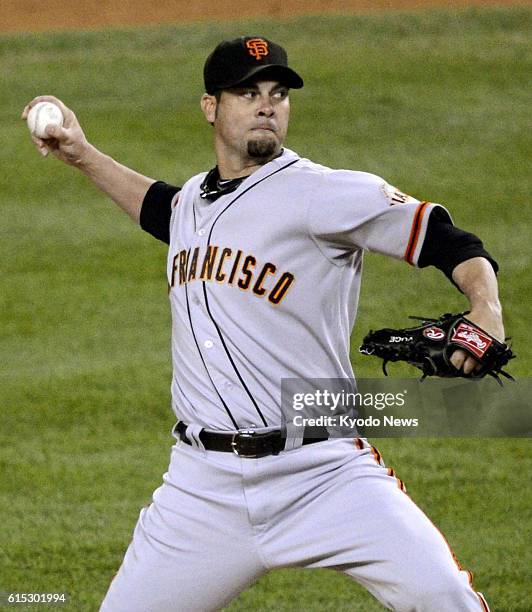 United States - San Francisco Giants starter Ryan Vogelsong pitches during Game 3 of the major league World Series against the Detroit Tigers at...