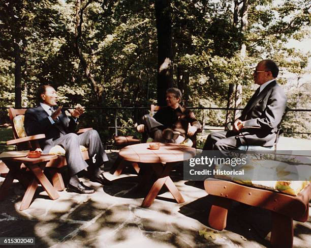 Presdent Carter, Israeli Prime Minister Menachem Begin and Egyptian President Anwar Sadat during the historic Camp David peace talks that resulted in...