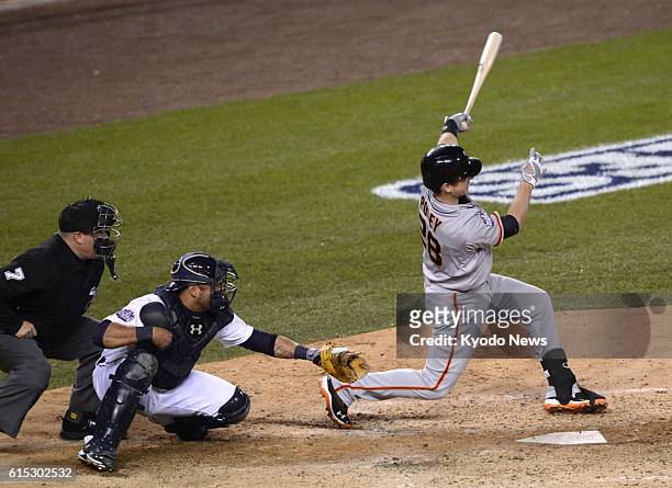 United States - San Francisco Giants catcher Buster Posey hits a two-run home run in the sixth inning of Game 4 of the major league World Series...