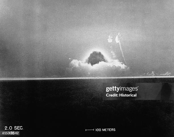 This photo taken at two seconds after Gadget's detonation at 5:29:45 a.m. Shows the tremendous fireball erupting in the early morning sky, proving...