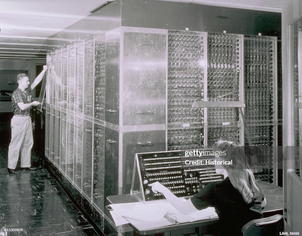 Man Installing Panel on Computer
