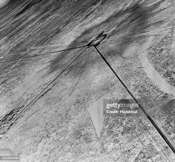 The scorch marks of the blast wave on the desert floor around the site of the shot tower where the 'Gadget' nuclear bomb was detonated in the Trinity...