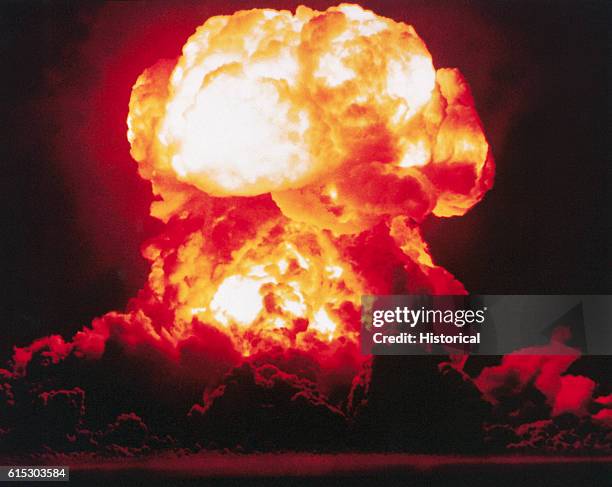 The detonation of the atomic bomb nicknamed "Smokey," as part of Operation PLUMBBOB in the Nevada desert. 1957.