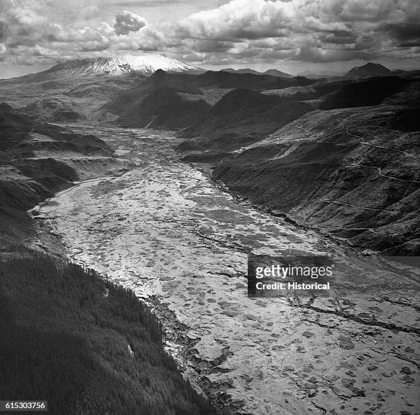 Volcanic mud fills the channel of the Toutle River, which flows west from the flanks of Mt. St. Helens. The mud flow charged down the river during...