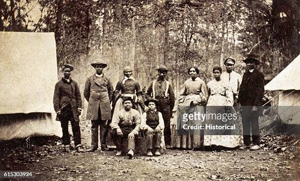 Group of freed slaves who worked as laborers and servants with the 13th Massachusetts Infantry Regiment during the American Civil War, 1862.
