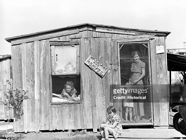 Home and family of an oil field roustabout in Oklahoma City, Oklahoma. August 1939.
