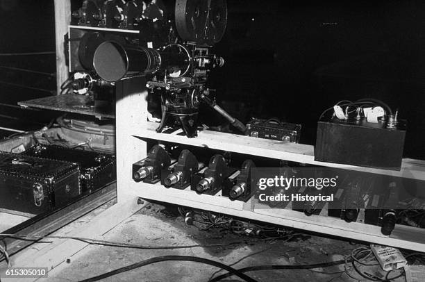 Collection of movie cameras waits ready to photograph the Trinity nuclear weapon test, near Los Alamos in 1945.