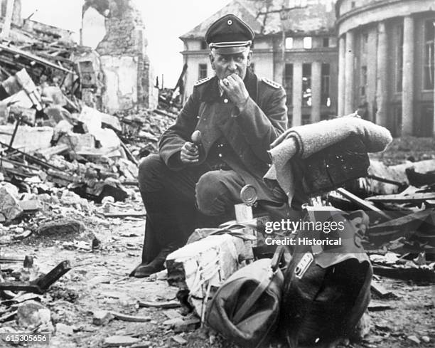 Nazi Food Rations A Nazi officer, eats from a can of C-rations in the ruins of... News ...