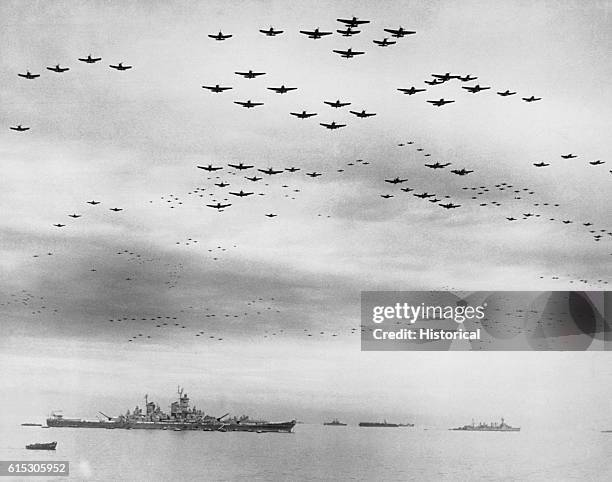 American fighter planes fly in formation over the USS Missouri in Tokyo Bay on September 2 during the ceremony in which Japan signed terms of...