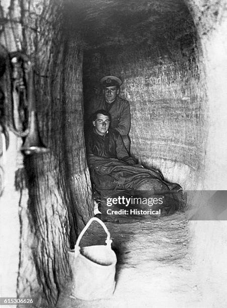 Beach. It was a terrible place to live. Shells would fall all through the night. British troops huddle in bombproof shelter, Dardanelles Campaign,...