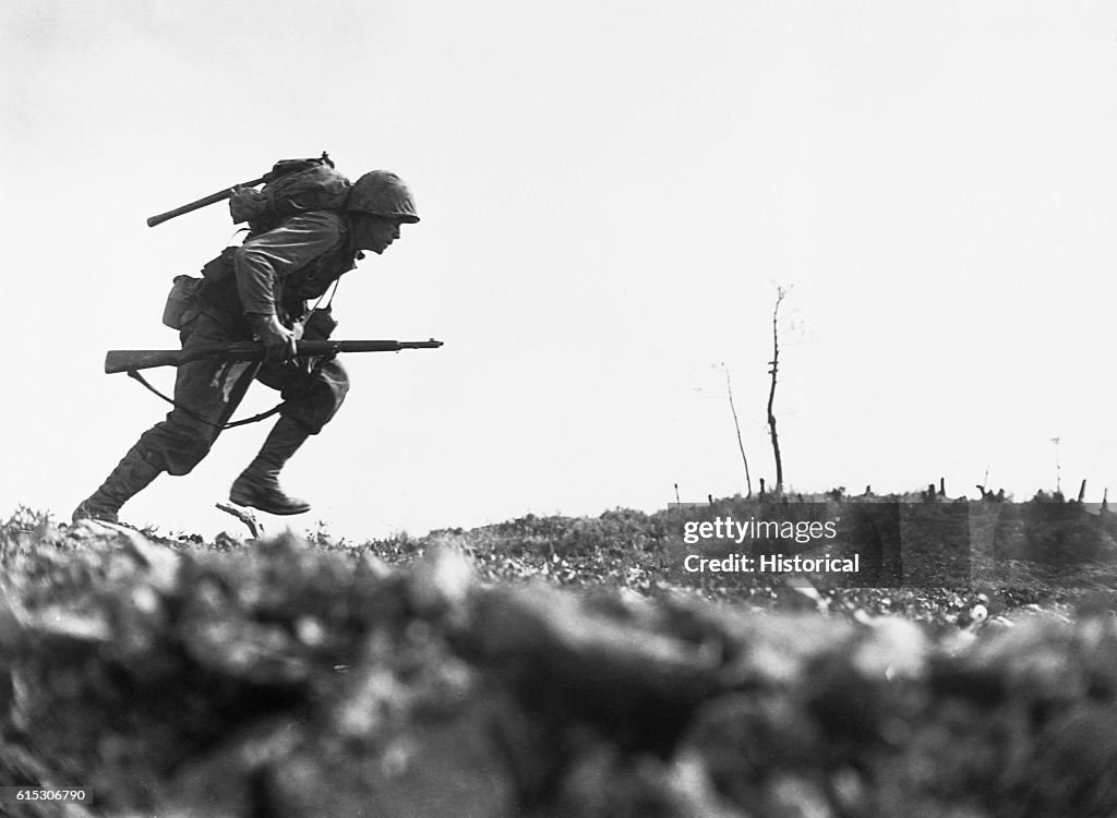 Marine Dashing Through Machine Gun Fire