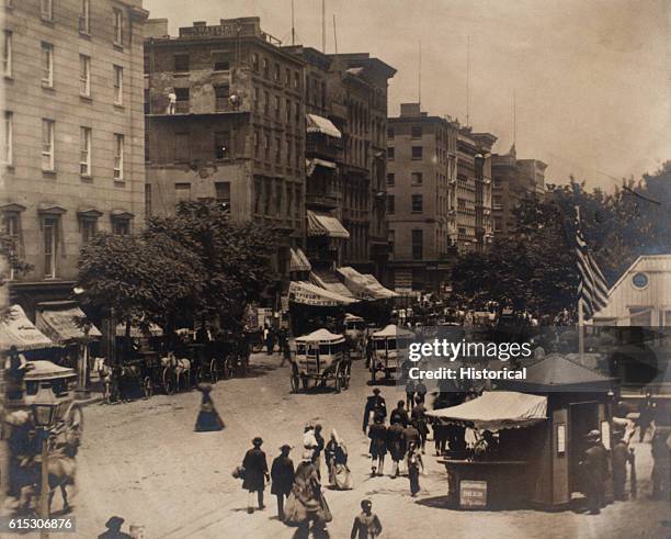 Union soldiers in uniform crowd the streets of New York during the American Civil War.