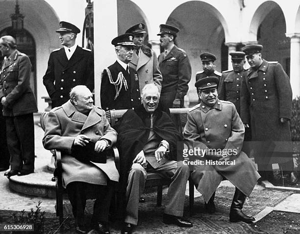 The Big Three at Yalta, confer to make final plans for the defeat of Germany. Here the Big Three, Prime Minister Winston S. Churchill, President...