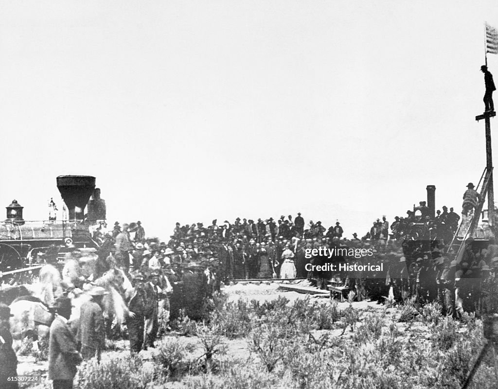 First Track Railroad A crowd gathers to see the joining of the tracks for the first... News ...