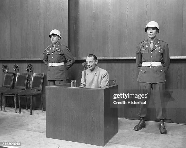 Hermann Goering, founder of the Gestapo and former head of the Luftwaffe, testifies from the witness stand at the Nuremberg war crimes trials,...