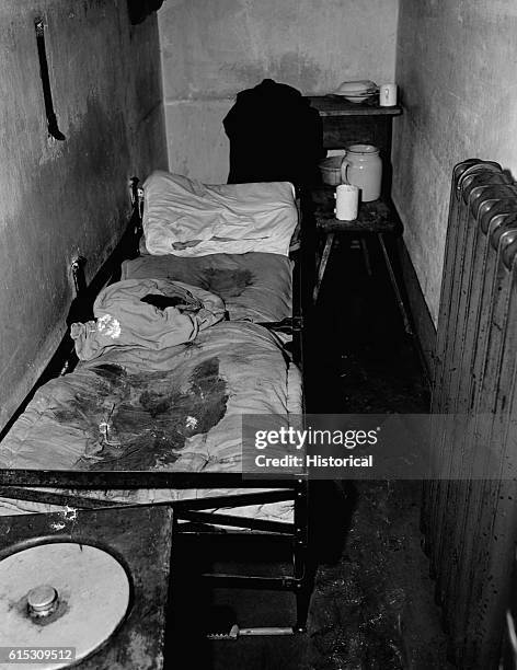 Filthy cot in a Gestapo prison in Cologne, Germany, 1945.