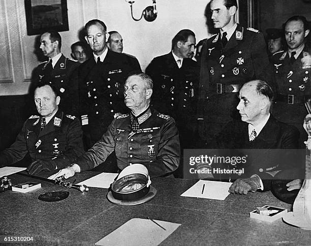 At a ceremony in the Soviet military headquarters in Berlin, Luftwaffe commanding General Hans Stumpf, Field Marshal Wilhelm Keitel, and Admiral...