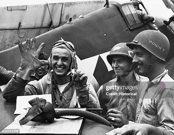 Lt. A. Vraciu, USNR, pilot of Squadron VF 16, aboard the USS Lexington during the attack on Saipan in the Marianas. He has downed 19 Japanese planes....