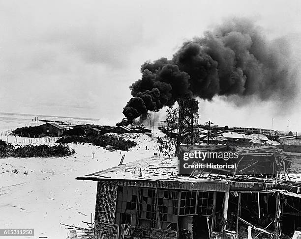 General view of damage on Midway before Japanese raiders were repelled, June 4-6, 1942. | Location: Midway Island, Central Pacific.