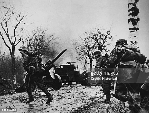 Captured Nazi film shows German soldiers advancing into Belgium in 1944 during the Battle of the Bulge.