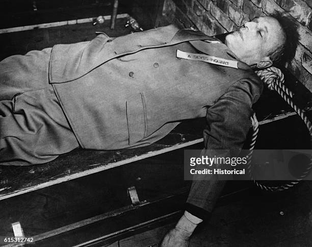 The corpse of Nazi war criminal Arthur Seyss-Inquart after his execution by hanging. Seyss-Inquart, the governor of Holland after its invasion in...