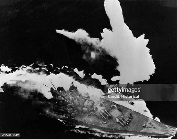 The powerful Japanese battleship Yamato is attacked from the air on April 7 during the battle of Okinawa. The ship was sunk after receiving hits from...