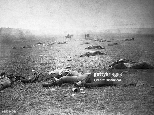 Dead soldiers lie on the battlefield at Gettysburg, where 23,000 Union troops and 25,000 Confederate troops were killed during the Civil War. July...