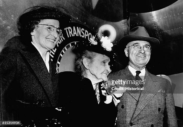 President Harry Truman with his mother, Martha Truman, and sister, Mary Truman, at the National Airport.