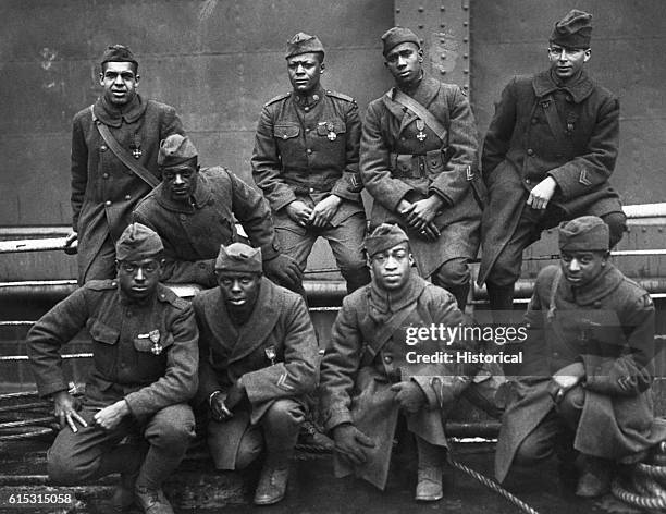 Nine African American soldiers who won the Croix de Guerre, 369th return home on the Stockholm, February 12,1919. | Location: on board the Stockholm.