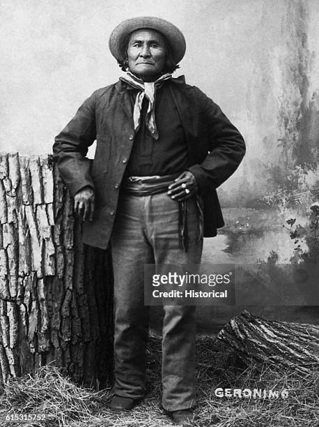 Apache chief Geronimo poses for a portrait not long after his final capture and placement at Fort Sill, Oklahoma in 1886. Geronimo's life was spent...