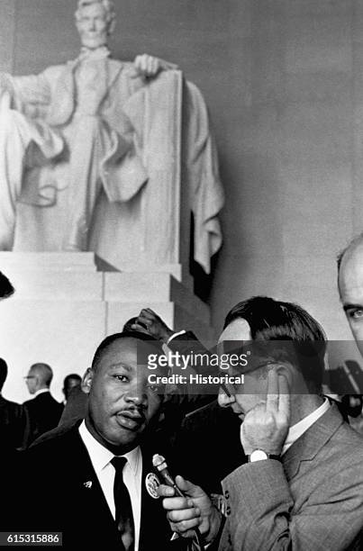 Reporter interviews civil rights leader Martin Luther King, Jr. At the 1963 Freedom March.