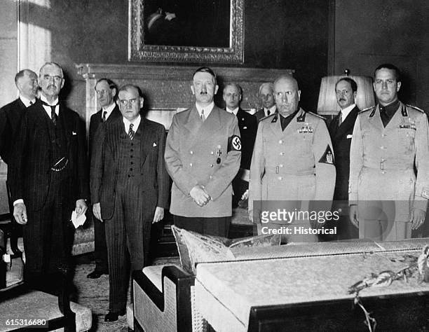 British Prime Minister Neville Chamberlain, French Premier Edouard Daladier, German Chancellor Adolf Hitler, Italian Prime Minister Benito Mussolini,...