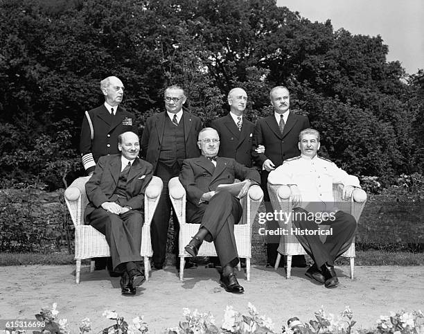 British Prime Minister Clement Attlee, American President Harry Truman, and Soviet Premier Joseph Stalin attend the Potsdam Conference in 1945.