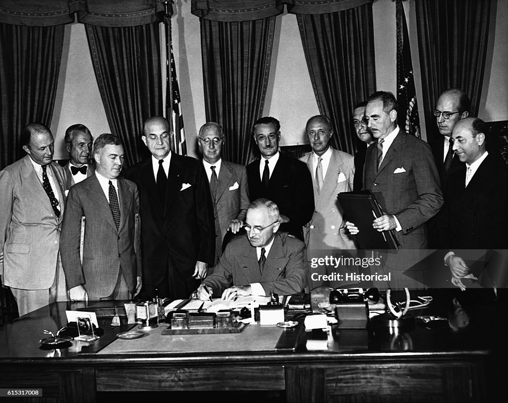 President Truman Signing NATO Pact