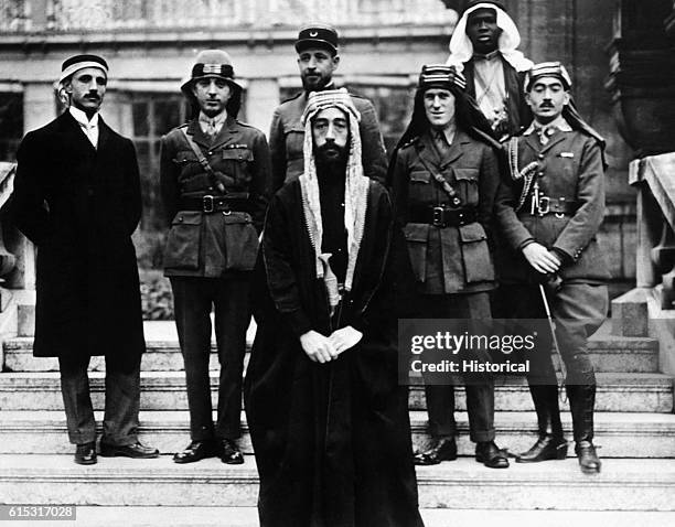 Faisal, son of Hussain of Mecca, with his delegates and advisors at the Versailles peace conference, 22nd January 1919. Faisal was briefly king of...