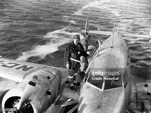 Richard E. Byrd stands on the wing of a Barkley-Grow T8P-1 seaplane after a flight attempt on an eastern exploratory cruise during his third...