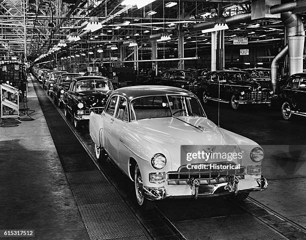 Cadillacs Rolling off Assembly Line