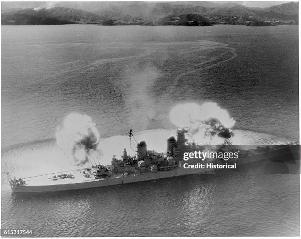 All nine 16" guns of the USS Missouri open fire on communist positions near the 38th Parallel at once.