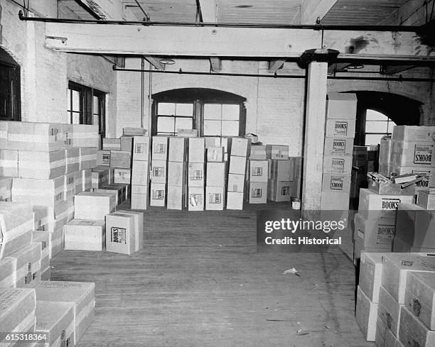 Shield of boxes on the sixth floor of the Texas School Book Depository in Dallas, Texas. Included as an exhibit for the Warren Commission. Ca....