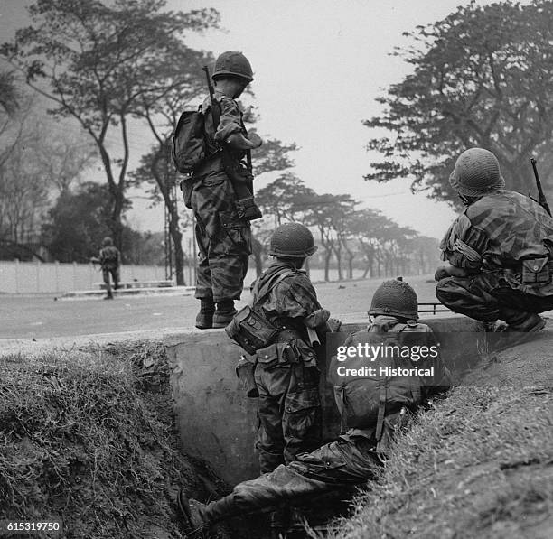 First Indochina War, 1945-55. Dien Bien Phu, the end of the French. Automatic weapons fire from ARVN troops pins down Binh Xuyen rebels at the Petrus...