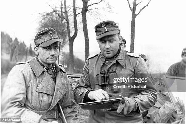 Captured German still photographs made during the Battle of the Bulge. December 17, 1944.