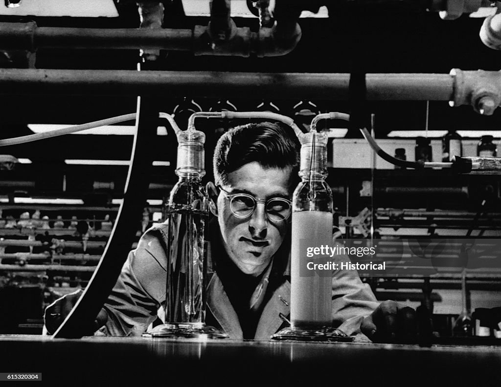 Scientist Performs Experiment