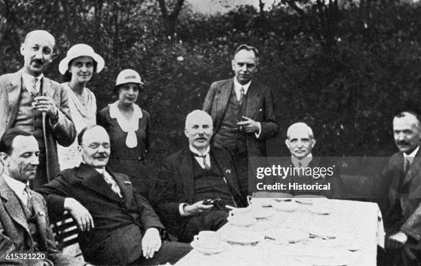 Group of physicists meets in Munster on the occasion of the Bunsengesellschaft. Left to right, seated: James Chadwick, Hans Geiger, Ernest...