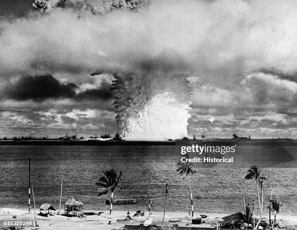 The "Baker" blast of Operation CROSSROADS, detonated underwater, sends up a huge column of seawater as part of its mushroom cloud.