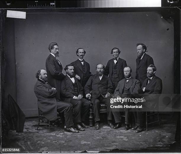 James A. Garfield , 20th President of the United States , poses with congressmen John H. Ketchum, Green B. Raum, and others.