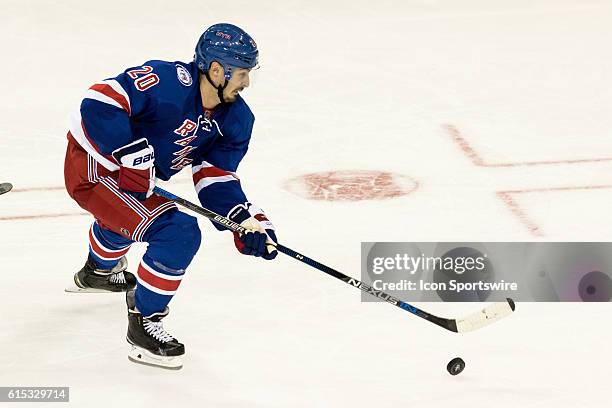 New York Rangers Left Wing Chris Kreider works towards the net during the third period of opening night at Madison Square Garden in a NHL game...
